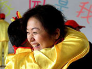 草根故事:&ldquo;阿甘妈妈&rdquo;胡艳苹