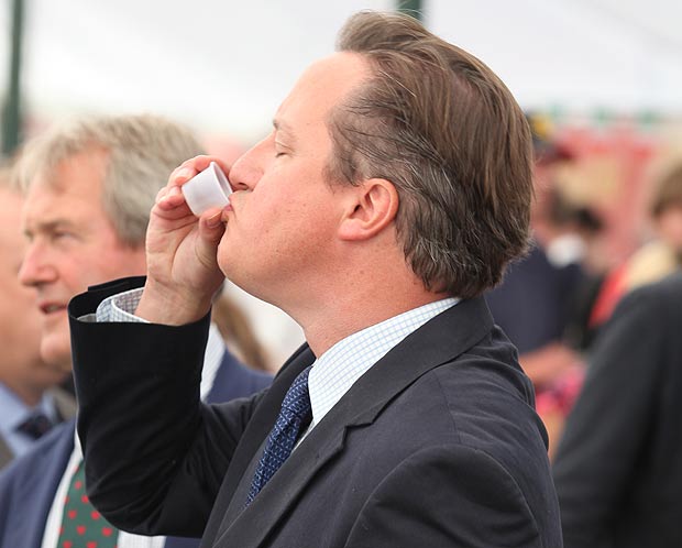 David Cameron samples a drink