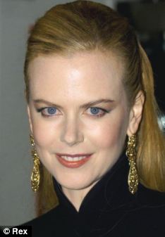 2001: Nicole and Tom split - irreconcilable differences