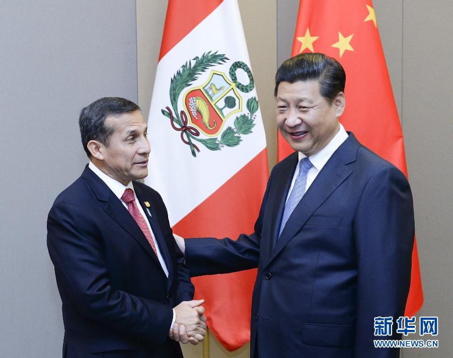 7月16日，国家主席习近平在巴西首都巴西利亚会见秘鲁总统乌马拉。新华社记者 刘建生 摄 