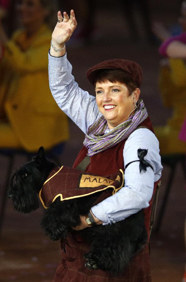 （体育）（3）小狗引导员成为英联邦运动会开幕式亮点