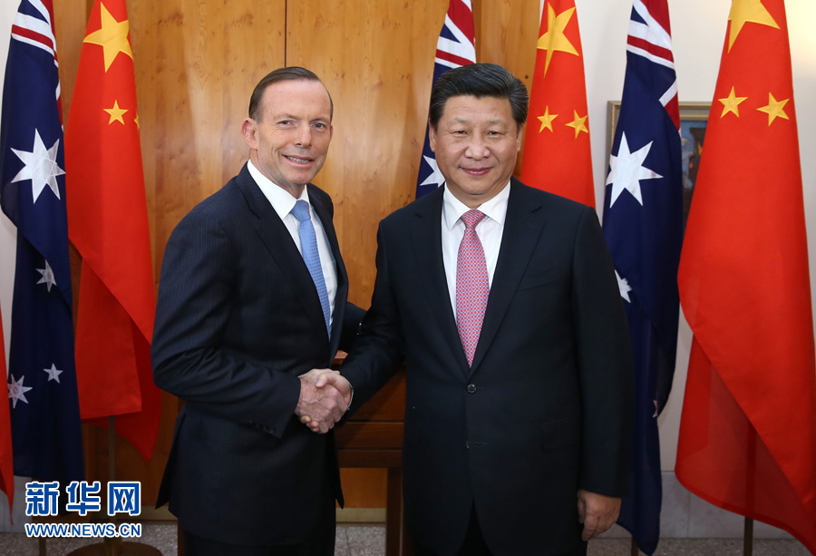 11月17日，國家主席習近平在堪培拉同澳大利亞總理阿博特舉行會談。 新華社記者 龐興雷 攝