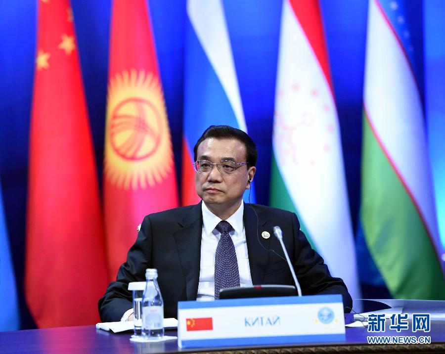 12月15日，中国国务院总理李克强在阿斯塔纳出席上海合作组织成员国政府首脑理事会第十三次会议。 新华社记者 饶爱民 摄 