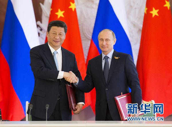会谈后，习近平与普京共同签署联合声明。 新华社记者 黄敬文 摄