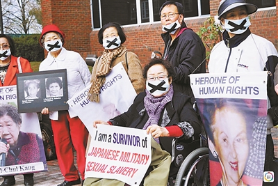 安倍4月哈佛大学演讲时，遭民众抗议 新华社发