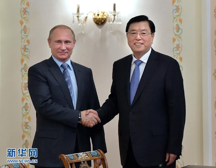  6月9日，全国人大常委会委员长张德江在莫斯科会见俄罗斯总统普京。新华社记者李涛摄 