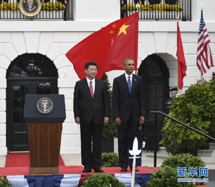 9月25日,美国总统奥巴马在华盛顿白宫南草坪举行隆重仪式,欢迎国家主席习近平对美国进行国事访问。 新华社记者 李学仁 摄 9月25日,美国总统奥巴马在华盛顿白宫南草坪举行隆重仪式,欢迎国家主席习近平对美国进行国事访问。 新华社记者 李学仁 摄