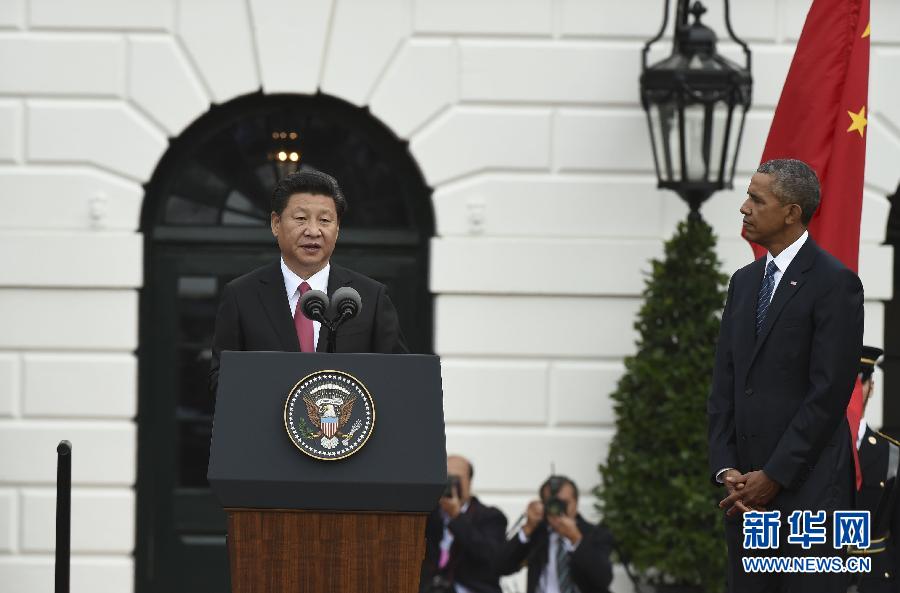 9月25日,美国总统奥巴马在华盛顿白宫南草坪举行隆重仪式,欢迎国家主席习近平对美国进行国事访问。 新华社记者 李学仁 摄 9月25日,美国总统奥巴马在华盛顿白宫南草坪举行隆重仪式,欢迎国家主席习近平对美国进行国事访问。 新华社记者 李学仁 摄