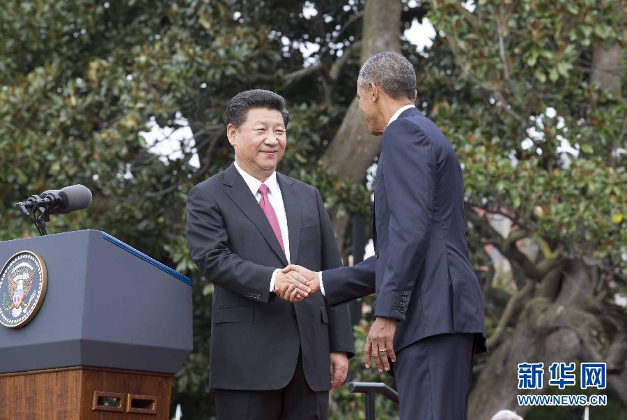 9月25日,美国总统奥巴马在华盛顿白宫南草坪举行隆重仪式,欢迎国家主席习近平对美国进行国事访问。 新华社记者 黄敬文 摄 9月25日,美国总统奥巴马在华盛顿白宫南草坪举行隆重仪式,欢迎国家主席习近平对美国进行国事访问。 新华社记者 黄敬文 摄