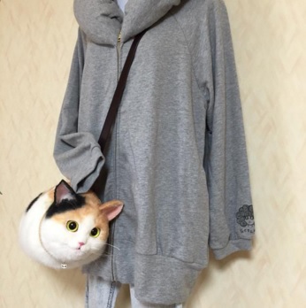 日本主妇设计 猫咪手袋 外形逼真卖断货 图 新华网