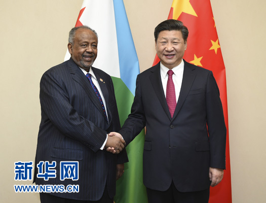 12月3日，国家主席习近平在约翰内斯堡会见吉布提总统盖莱。新华社记者 谢环驰 摄 


