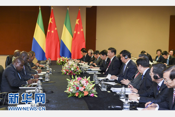12月3日,国家主席习近平在约翰内斯堡会见加蓬总统邦戈。新华社记者 谢环驰 摄 12月3日,国家主席习近平在约翰内斯堡会见加蓬总统邦戈。新华社记者 谢环驰 摄