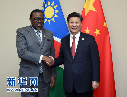 12月4日，國家主席習近平在約翰內斯堡會見奈米比亞總統根哥布。 新華社記者 張鐸 攝