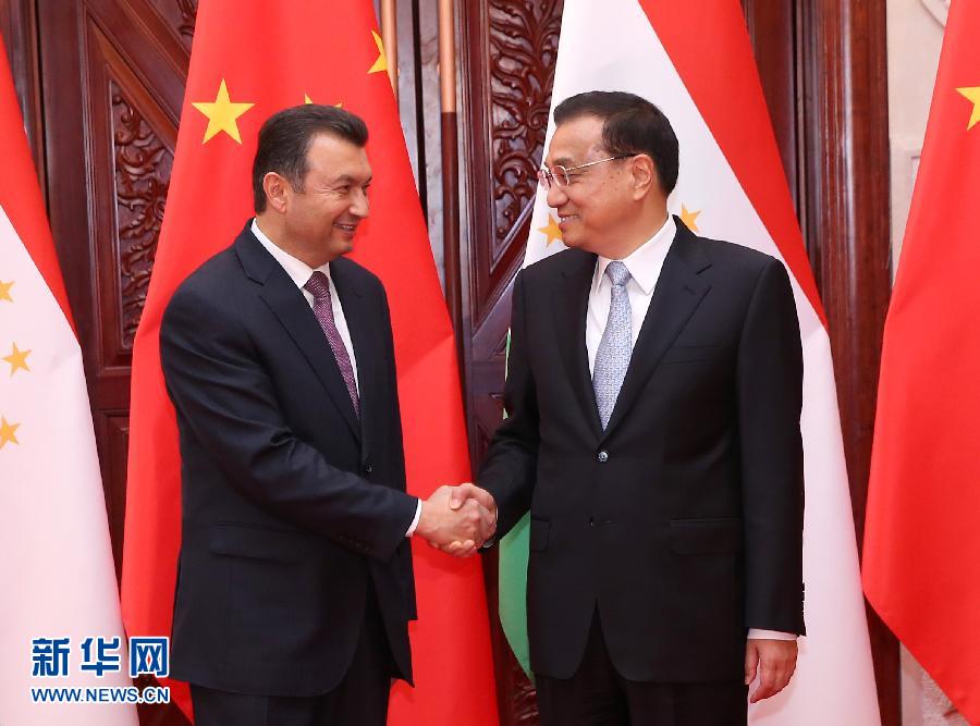 12月15日，国务院总理李克强在郑州黄河迎宾馆会见来华出席上海合作组织成员国总理第十四次会议的塔吉克斯坦总理拉苏尔佐达。 新华社记者 庞兴雷 摄