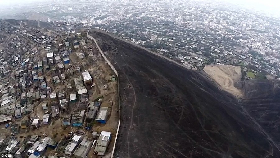 秘鲁版&ldquo;柏林墙&rdquo;分隔穷人和富人