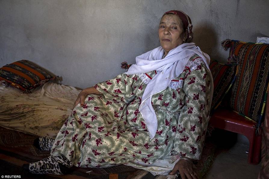 百岁老人脸部纹身悔一生 捐赠财产求救赎