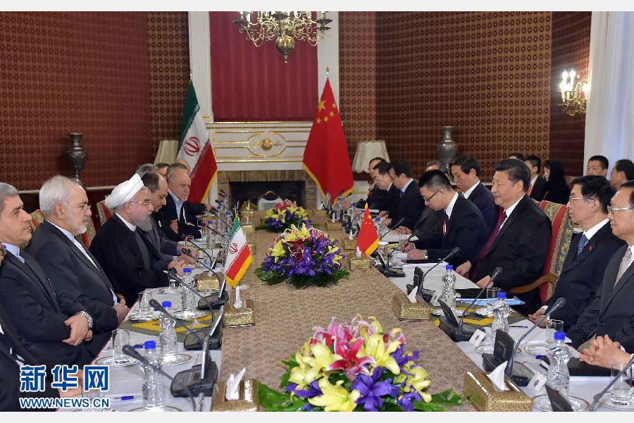 1月23日，国家主席习近平同伊朗总统鲁哈尼在德黑兰萨德阿巴德王宫举行会谈。 新华社记者 李涛 摄 