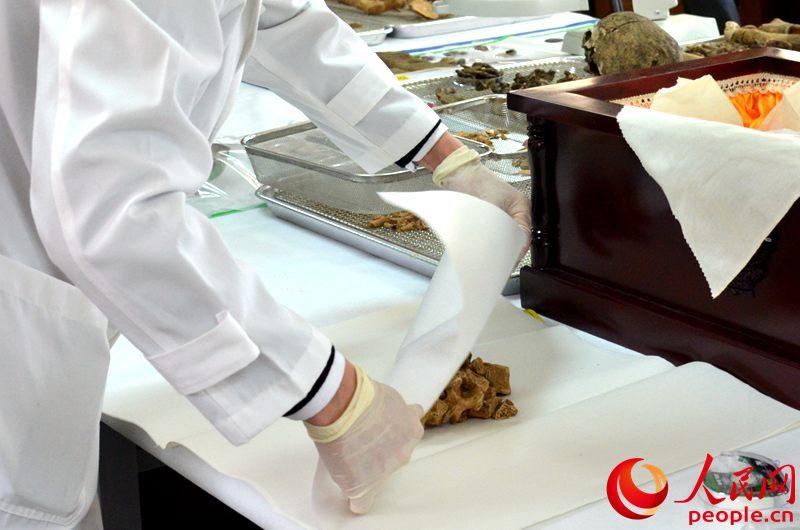 中韩双方举行第三轮在韩志愿军烈士遗骸装殓仪式