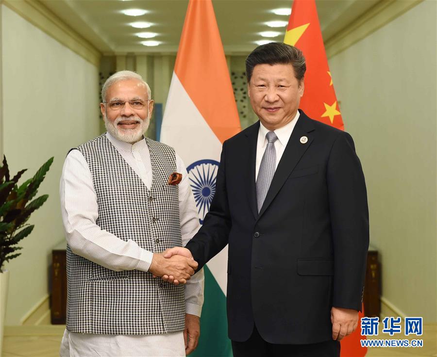 6月23日，国家主席习近平在乌兹别克斯坦塔什干会见印度总理莫迪。新华社记者 饶爱民摄 