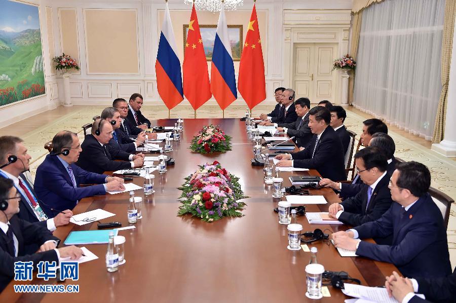 6月23日，国家主席习近平在乌兹别克斯坦塔什干会见俄罗斯总统普京。新华社记者李涛摄