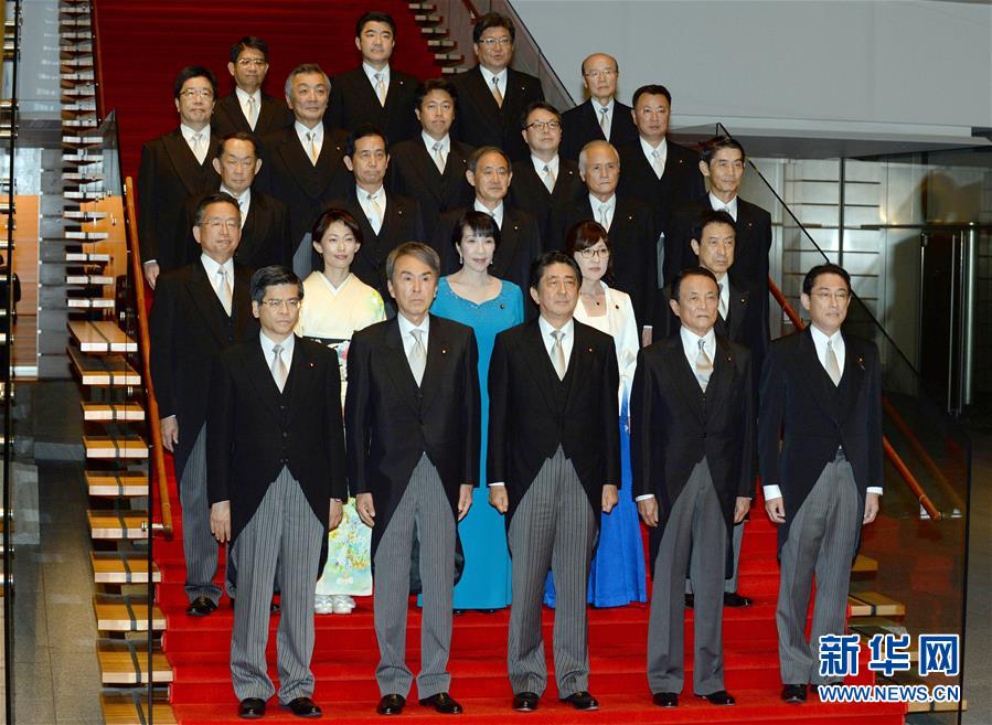 （国际）（1）安倍部分改组内阁主要阁僚留任 