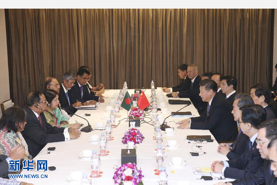 10月14日，国家主席习近平在达卡会见孟加拉国国民议会议长乔杜里。 新华社记者庞兴雷摄 