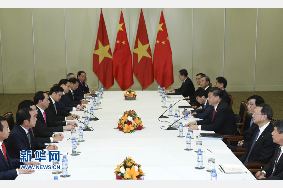 11月19日，国家主席习近平在利马会见越南国家主席陈大光。新华社记者 庞兴雷 摄 