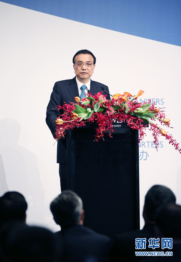 当地时间3月24日，中国国务院总理李克强在悉尼与澳大利亚总理特恩布尔共同出席中澳经贸合作论坛并发表演讲。 新华社记者 姚大伟 摄