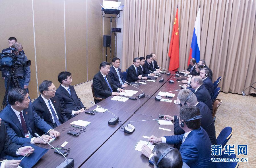 6月8日，国家主席习近平在阿斯塔纳会见俄罗斯总统普京。 新华社记者李涛 摄