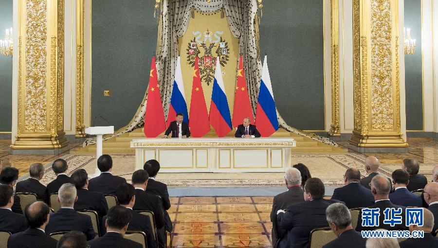 7月4日，國家主席習近平在莫斯科同俄羅斯總統普京共同會見中俄友好、和平與發展委員會，媒體和企業界代表。 新華社記者 李學仁 攝