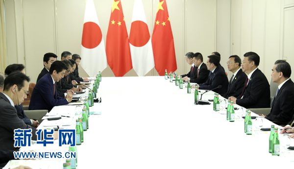 7月8日，国家主席习近平应约在汉堡会见日本首相安倍晋三。新华社记者 马占成 摄