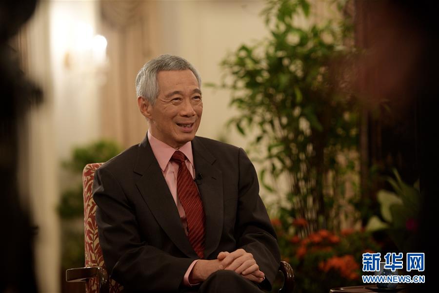 (国际·“一带一路”高峰论坛·图文互动)重庆互联互通示范项目可为区域国家发展提供服务——访新加坡总理李显龙