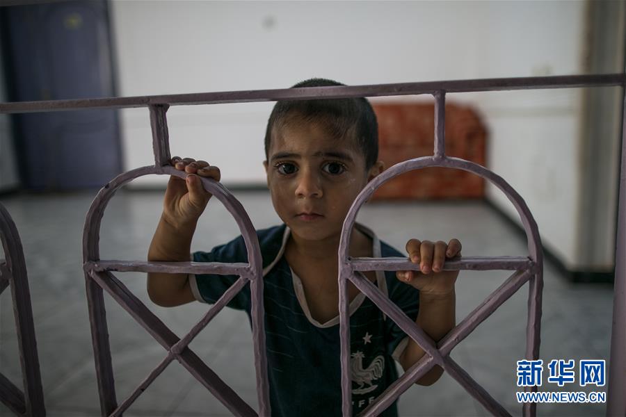 （国际）（8）何以为家——生活在一栋废弃楼房中的利比亚儿童