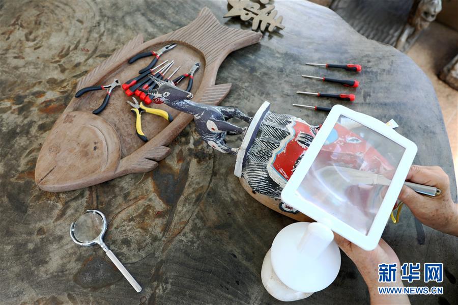 (国际·图文互动)(6)通讯:收藏“非洲之美”的中国人——访几内亚湾非洲国际艺术博物馆馆长谢燕申