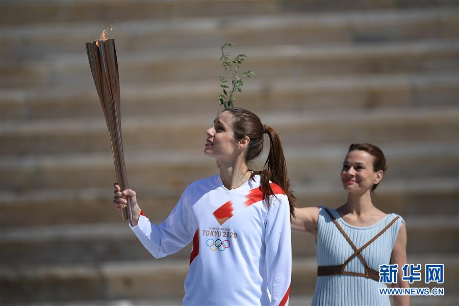 （体育）（7）东京奥运会圣火交接仪式在雅典举行