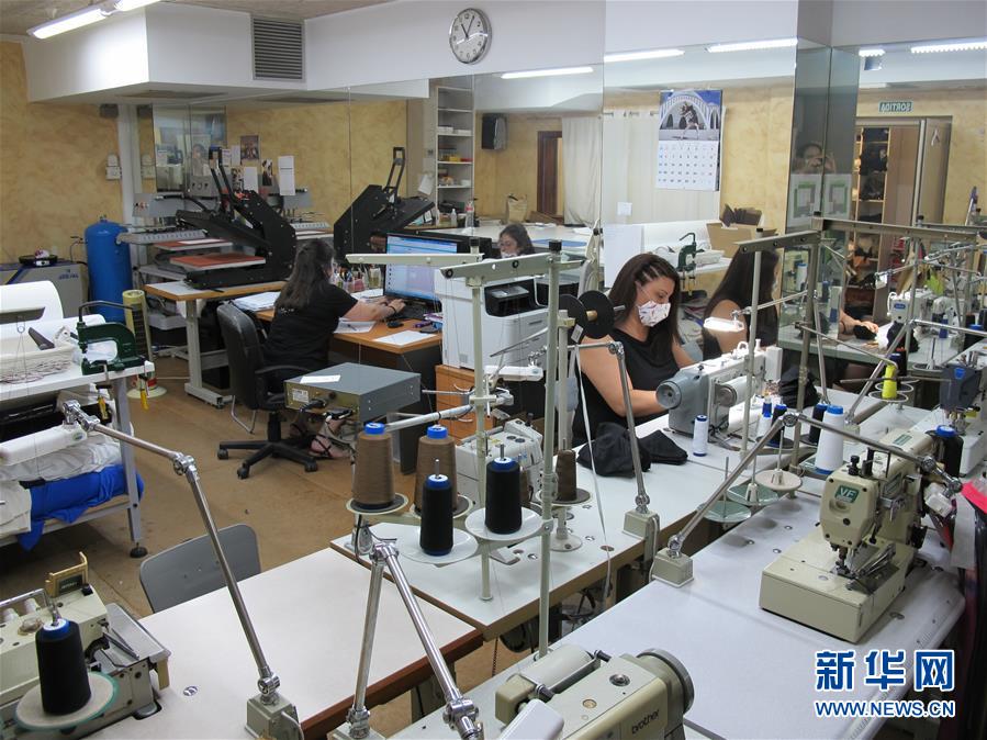 （国际疫情）（6）西班牙：她将裁缝铺改造为口罩生产厂