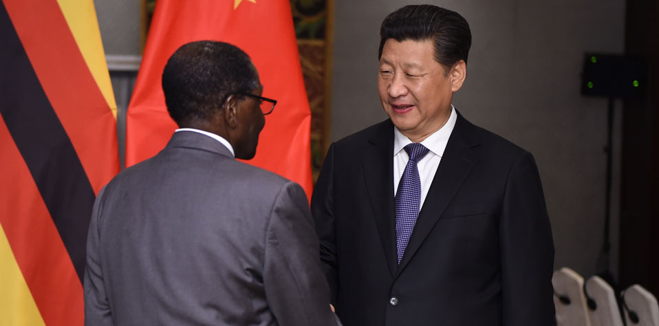 习近平会见津巴布韦总统穆加贝