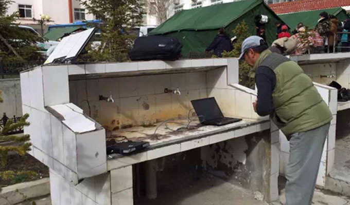 灾区新华人:有苦有责有担当