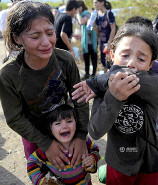 白宫：难民真惨 但请别来