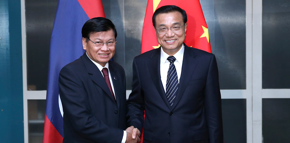 7月14日：李克强会见老挝总理通伦