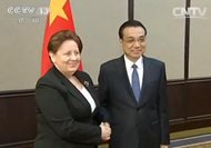 李克强会见拉脱维亚总理