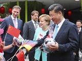 习近平同德国总理默克尔共同出席柏林动物园大熊猫馆开馆仪式