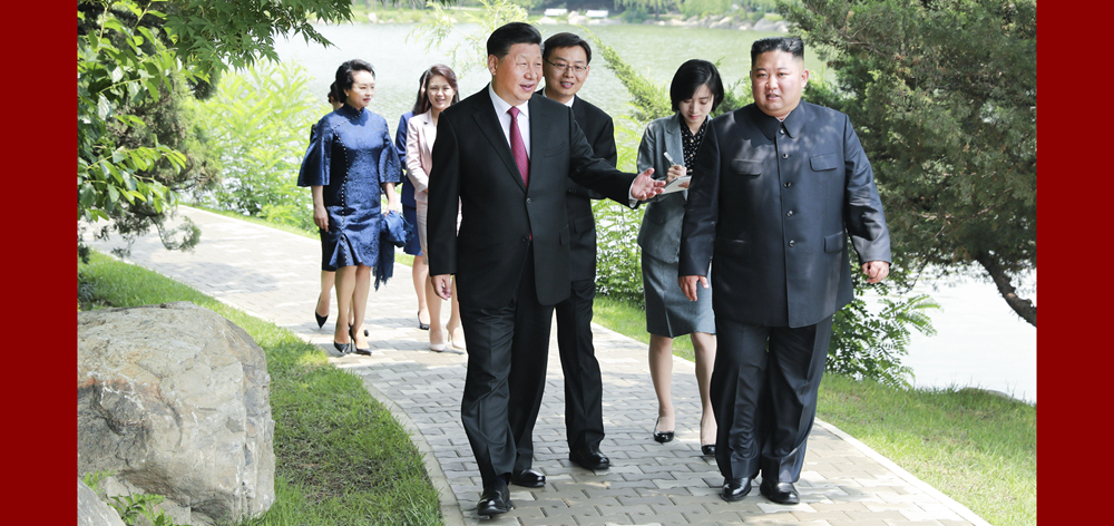 习近平会见朝鲜劳动党委员长、国务委员会委员长金正恩