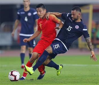 足球——世預賽：中國隊勝關島隊
