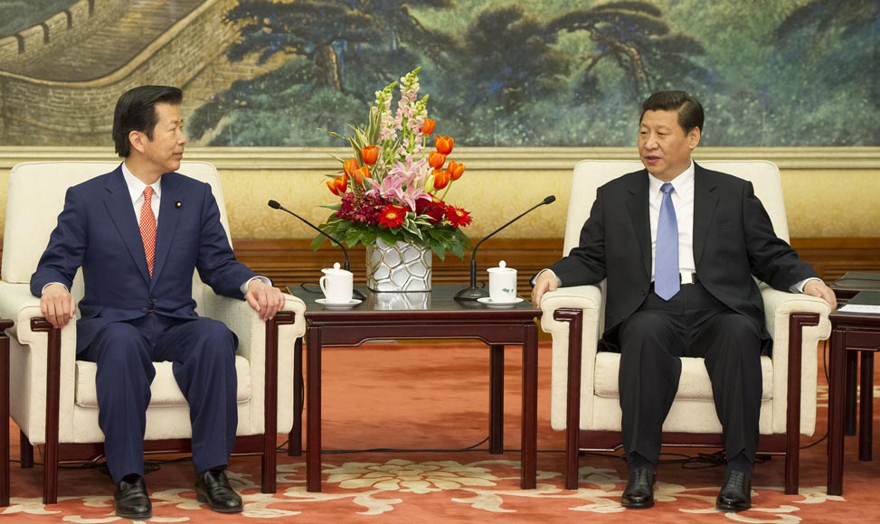 习近平会见日本公明党党首山口那津男