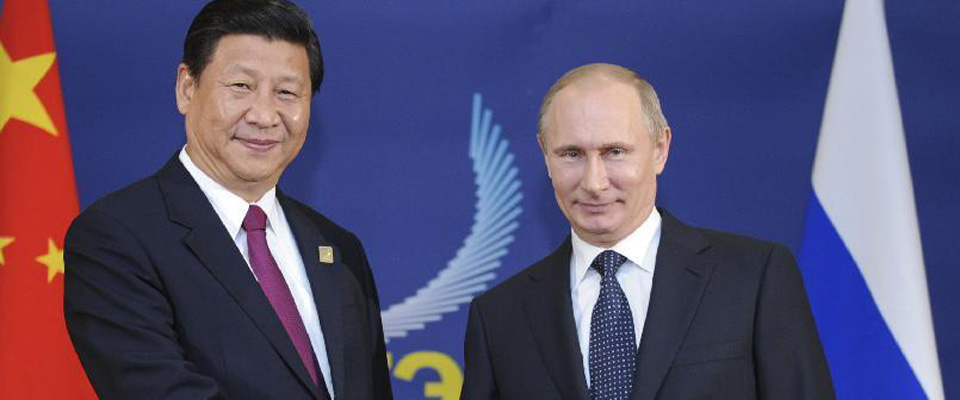 2013年10月，习近平会见俄罗斯总统普京