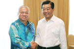 贾庆林会见马来西亚前上议长王茀明