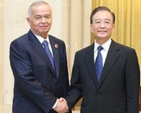 温家宝会见乌兹别克斯坦总统