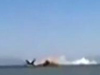韩客机降落坠毁现场 机尾着地腾火球