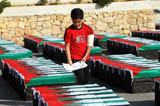 约旦河西岸民众摆放“棺材” 抗议以军空袭(组图)
